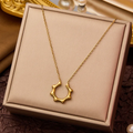 Abstract Sunburst Open-Circle Necklace – Gold Statement Pendant