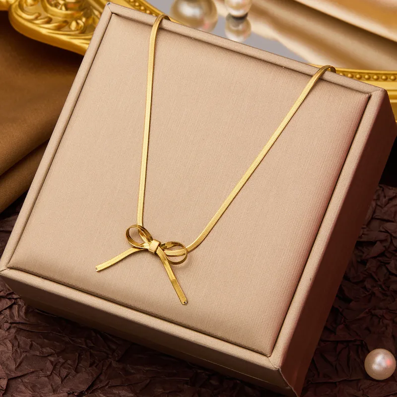 Gold Silk-Finish Herringbone Bow Necklace – Sleek Flat Snake Chain